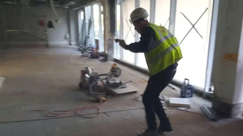 Builder is dancing on construction site Stock Footage 73559350