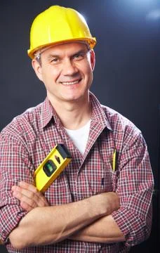 Builder on a dark background Foto stock
