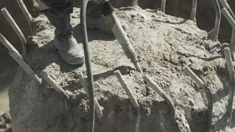 Builder destroys foundation with impact hammer Stock Footage 285140660