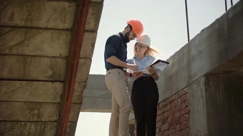 Builder Developer Architect Blueprint.Building Project Manager Construction Site Stock Footage 133759557