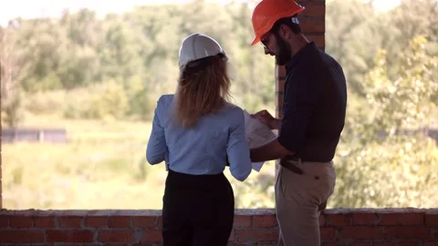Builder Developer Architect Blueprint.Building Project Manager Construction Site Stock Footage 134449668