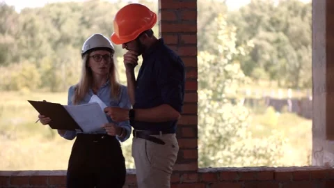 Builder Developer Architect Blueprint.Building Project Manager Construction Site Stock Footage 134450236