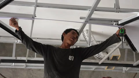 The builder do repaire in office. Stock Footage 299964235