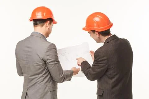 Builder with drawings are back Stock Photos