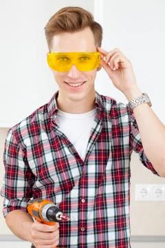 Builder with a dril Stock Photos