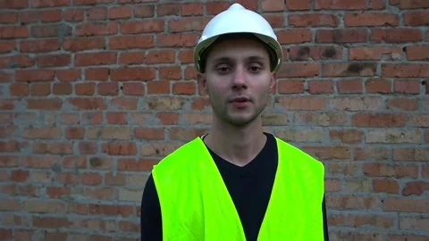 A Builder with a drill Stock Footage 75619368