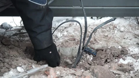 Builder Drills a hole in the wall with a Hammer Drill Stock Footage 263294864