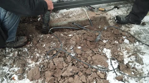 Builder Drills a hole in the wall with a Hammer Drill Stock Footage 263294867