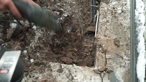 Builder Drills a hole in the wall with a Hammer Drill Stock Footage 263294871