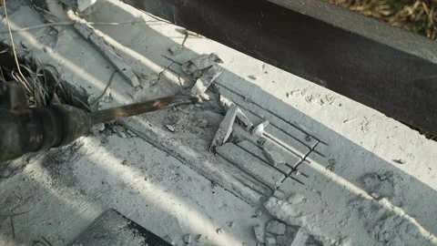 Builder Drills a hole in the wall with a Hammer Drill Stock Footage 269495244
