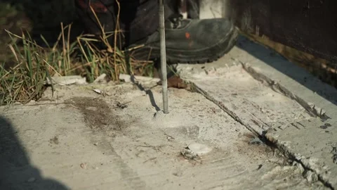 Builder Drills a hole in the wall with a Hammer Drill Stock Footage 269495269