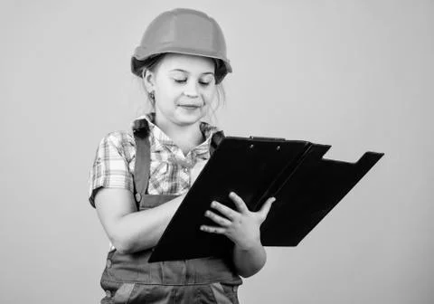Builder engineer architect. Kid worker in hard hat. Child care development Stock Photos
