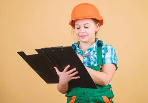 Builder engineer architect. Kid worker in hard hat. Child care development Stock Photos