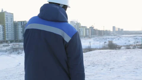 Builder engineer at construction site talking on phone Stock Footage 86930052