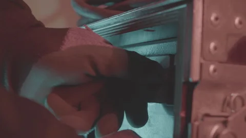 Builder in gloves switches power machine turning knobs 스톡 동영상 268419771