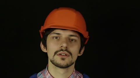 Builder in helmet Stock Footage 25107786