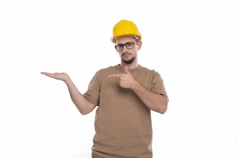 Builder Holding Hand to Side Pointing at It Isolated. Man Construction Worker Stock Photos