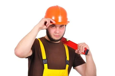 Builder holding water level Stock Photos