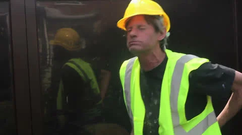 Builder hurts his back Video stock 25641954