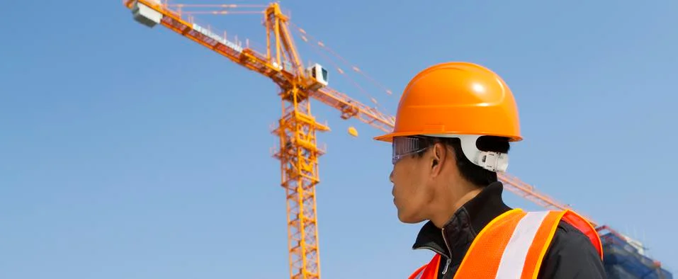Builder inspector under construction Foto stock