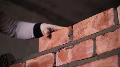 Builder lays a brick wall Stock Footage 221957868
