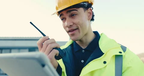 Builder, man and tablet with radio on construction site for architecture project Stock Footage 345645075