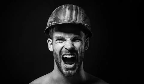 Builder man, closeup portrait. Building industry. Screaming angry architect.. Stock Photos