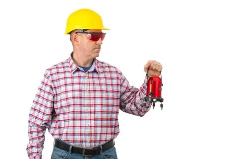 Builder man with   laser level on  isolated background Stock Photos