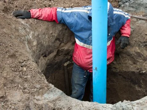The builder in the pit Stock Photos