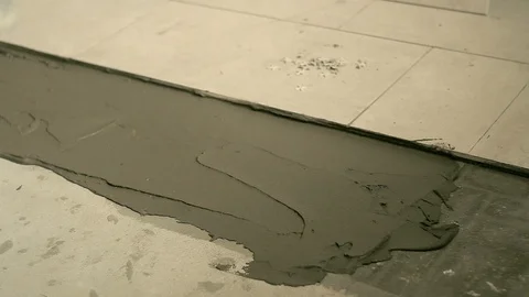 Builder plaster mortar for laying tiles Stock Footage 90062745