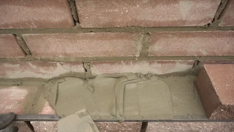 Builder Puts A Brick Building Wall Stock Footage 114506700