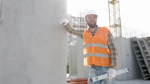 Builder repairman works at his workplace in a building Stock Footage 295218593