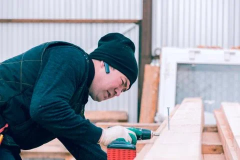 The builder with a screwdriver 스톡 사진