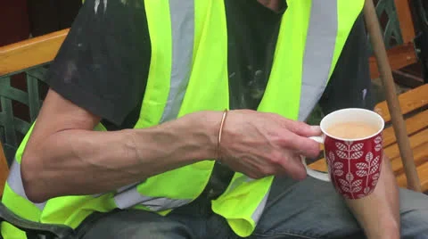 Builder on site drinks tea and smokes Stock Footage 25169720