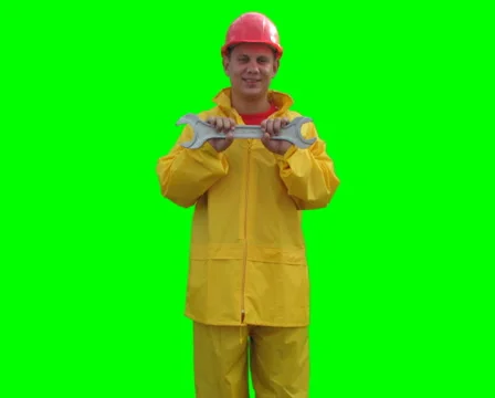Builder spins with wrenches on the Green Screen LOOP PAL Stock Footage 1059436