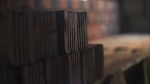 Builder stacking bricks with hands Stock Footage 276668491