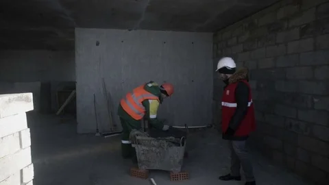 Builder takes the cement Stock Footage 82068728