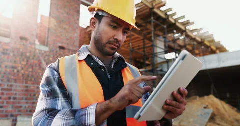 Builder, thinking and man with tablet at construction site, architecture or Stock Footage 336224583