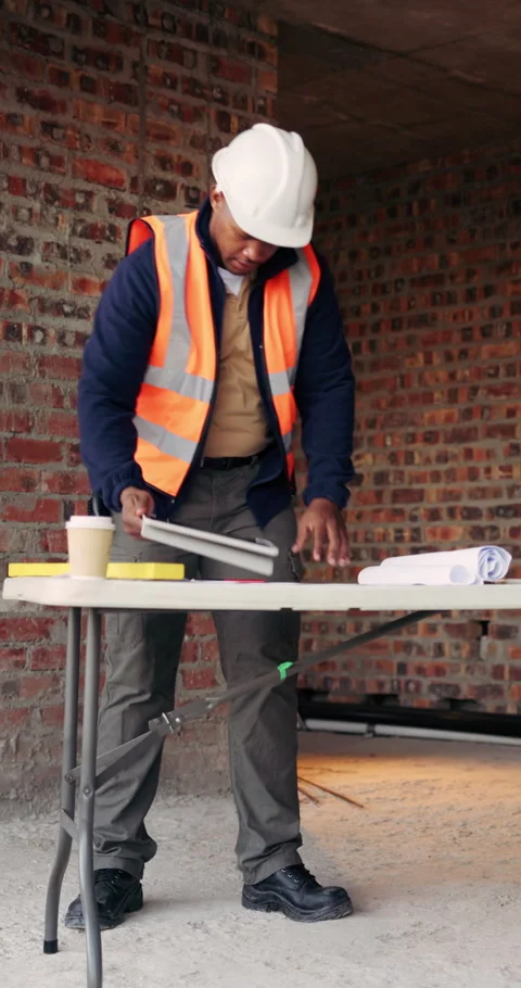 Builder, thinking and man with tablet in building, search or safety inspection Video stock 336242871