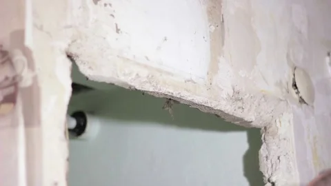 Builder two hammers break the concrete wall Stock Footage 74794183