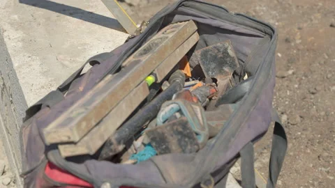 Builder Uses Measuring Tape From Tool Bag And Throws It Back In 스톡 동영상 239754576