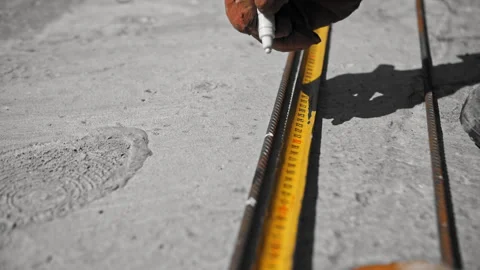 Builder uses a tape measure Stock Footage 241839242