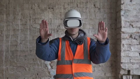 Builder uses virtual reality glasses at a construction site Stock Footage 121209836