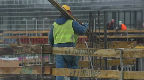 Builder Walks On Construction Stock Footage 47930626