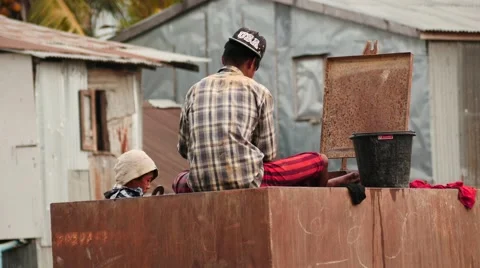 Builder washing working clothes - Myanmar 2016 Stock Footage 61450004
