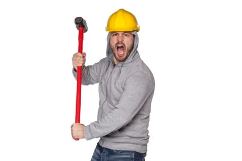Builder on a white background, holding a hammer and shouting Stock Photos