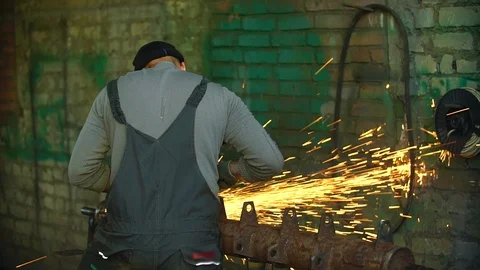 Builder working With angle Grinding Machine At Construction Site 動画素材 112428283