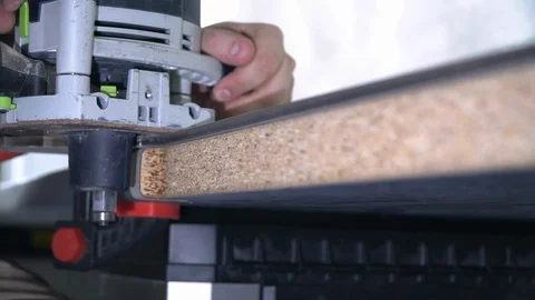 The Builder works with an electric cutter 库存影片 103949177
