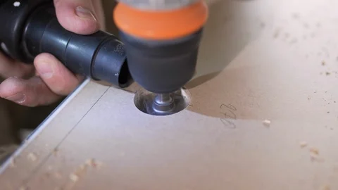 The Builder works with an electric cutter Video stock 103949789