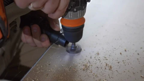 The Builder works with an electric cutter 스톡 동영상 103950173